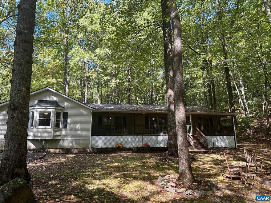 Waters Edge Retreat features 10 acres perfectly nestled between the majestic Piney Mountain and the flowing Rockfish River. Offering complete privacy and peace, this natural haven features a trail to the riverside, a camp firepit, and opportunities for both fishing and swimming in the cool waters of the river. Surrounded by towering hardwood trees, the property provides ample space to explore, roam, and hike at your leisure. The spacious home comfortably sleeps 10, with a open-concept kitchen that?s perfect for group meals. Gather around the wood stove in the family entertainment room for cozy evenings or relax on the oversized screened porch and take in the fresh mountain air. Whether you're seeking a peaceful escape or a base for outdoor adventure, this lakeside retreat promises an unforgettable experience.,Formica Counter