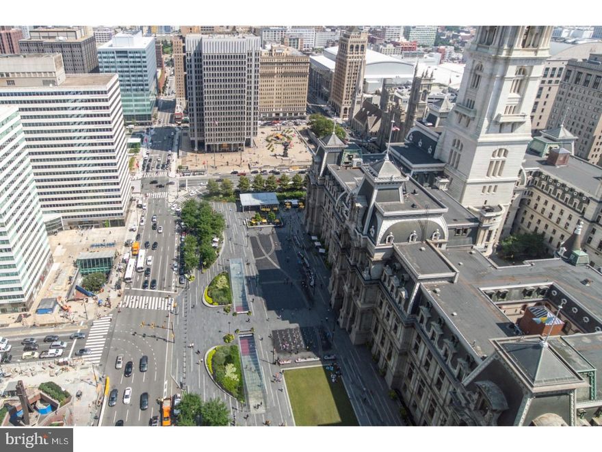 Enjoy the unparalleled amenities and service of the Residences at the Ritz Carlton! This large two bedroom, three full bathroom plus powder room condominium comes with breathtaking views from every room of the newly renovated Dilworth Plaza and Ben Franklin atop the gorgeous architecture of City Hall, sweeping city views and river views to top it off! One of the most desirable and open floor plans in the building! All DE units originally sold out from developer (only 11 in entire building). Open kitchen with large island, dining room and living room all look out to Dilworth Plaza! Each bedroom on separate wings of the residence. Beautiful hardwood floors throughout! Kitchen includes granite counter tops, top of the line appliances including a Viking range, Miele Dishwasher, Sub Zero refrigerator, built in wine refrigerator, warming oven, Dornbracht fixtures, Franke stainless steel under mount sink, and glass tile backsplash. Large master suite with two closets, both outfitted with custom California closet systems. Dual his and her gorgeous master bathrooms which feature Calacatta marble throughout, double vessel sinks, Bain ultra soaking tub, Duravit commodes, and separate stall shower with frameless glass enclosure. Powder room, two large storage closets in hallway and full laundry room with Bosch washer and dryer complete the unit.  Condo fees include: Chauffeur Service in a Bentley sedan or Cadillac SUV, state-of-the-art Fitness Center w/lap pool, hot tub & yoga room, private landscaped park with 12' waterfall, Residents' Lounge, Media room & outdoor terrace.