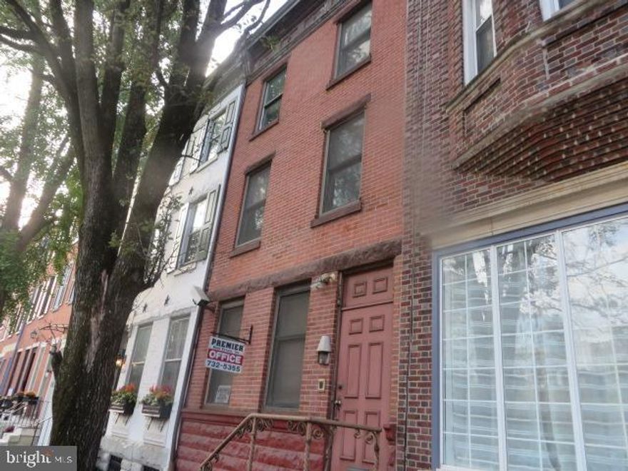 Three story office building located just off of 17th and Pine Street and close to Rittenhouse Square. Approximately 2400 sq ft. of office space on 3 floors. 1st floor reception area, common office space plus rear private office with bathroom and rear patio. 2nd floor conference room,  rear private office, powder room, plus additional office space. Third floor has 3 private offices, common office space plus powder room. Attic allow for plenty of storage space . Full basement. Three zone heating and central air. Parking lot directly across from office or possible monthly parking space available.