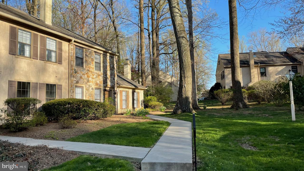 Opportunity to live in an almost fully renovated end unit townhome with a first floor primary in the desirable community of Weatherstone! Enjoy convenient one floor living with enough space to expand to the finished second floor or the unfinished lower level to suit your lifestyle. The ground level entrance provides easy access to the center hall. The large living room with laminate floor has a fireplace, two windows allowing optimal sunlight and is open to the dining room. The dining room flows easily to the completely redone eat-in kitchen or through sliding doors to the fenced patio. The kitchen has ample room for daily meals and also has sliding doors to the patio for ease of entertaining a group or a table for two! The first floor also includes a large primary bedroom and bath with good sized closets. In addition, there is a powder room and laundry. The steps lead to a second floor that includes two ample sized guest rooms, a full bath and an additional finished loft for an in-home office, additional storage, or an additional bedroom. Downstairs is a huge unfinished lower level with high ceilings. Weatherstone provides a carefree lifestyle with the homeowner's association taking care of the trash, landscaping, and snow removal. You can lock and go, or stay and enjoy the community pool and clubhouse. Walk to the Paoli train station in minutes or take a short drive to fine shops, restaurants, schools, and major highways. Absolutely no pets. 1st month and last month rents, and one month security to move-in.