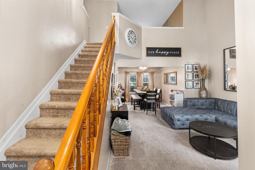 Beautifully maintained 3-bedroom corner property offering a bright and open layout in a highly desirable Dover community. Inside, discover a stunning two-story family room with vaulted ceilings that seamlessly flows into the formal dining room—perfect for both everyday living and entertaining. The eat-in kitchen features stainless steel appliances and connects to a cozy family room highlighted by a wood-burning fireplace. Upstairs, a versatile loft area overlooks the main living space, adding to the home’s open and airy feel. The upper level also includes three spacious bedrooms and two full baths, including a luxurious Primary Suite with an ensuite bath and walk-in closet. Enjoy outdoor living on the rear concrete patio complete with a freestanding pergola. An attached two-car garage adds convenience to this move-in ready home. Mortgage savings may be available for buyers of this listing.