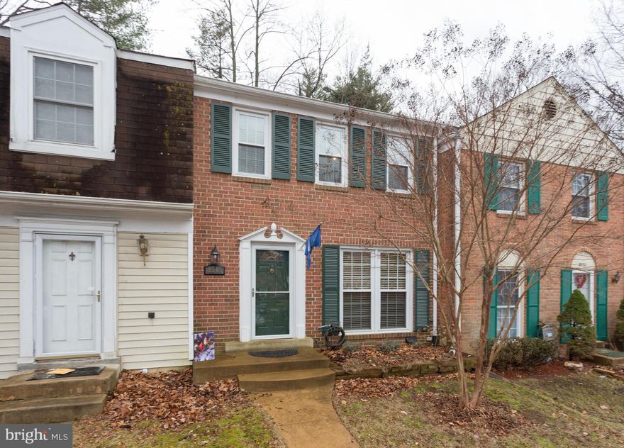 Beautiful well-maintained brick-front 3BR, 2 full/2 half BA TH in quiet neighborhood. Features eat-in kitchen w/granite countertops, SS appliances and maple cabinets. Hardwood floors on main level, stairs, and master bedroom. Upgraded bathrooms, renewed basement, laundry room w/ built-in cabinets/updated washer & dryer. 2 reserved parking spaces! Fabulous school pyramid! Think quick!!