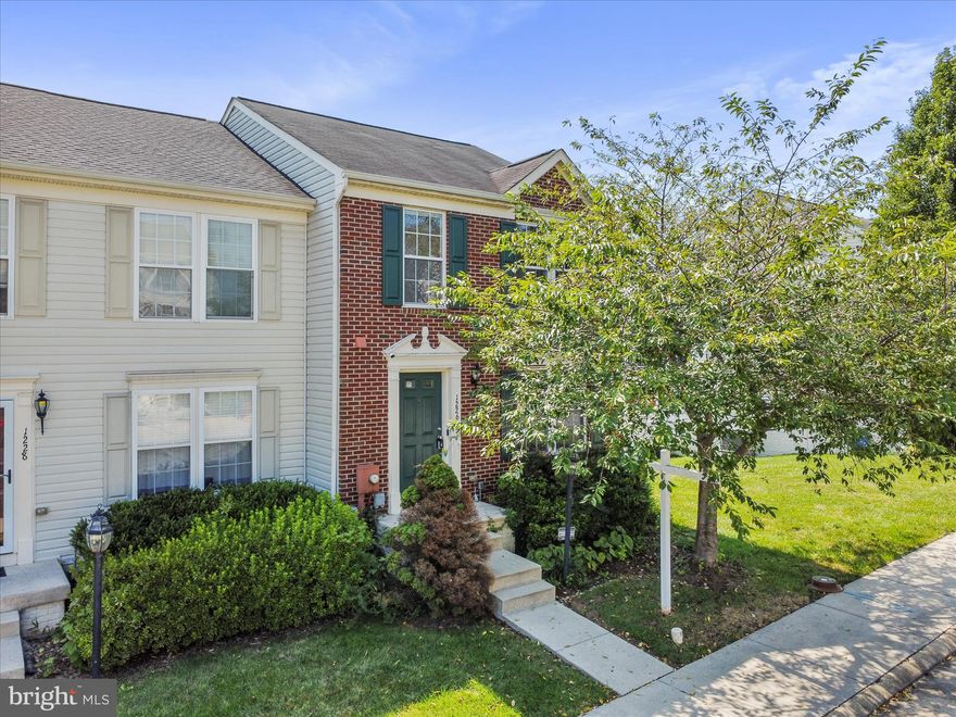 Spacious end unit townhome with finished basement in the desirable neighborhood of Lakeland Place at Fairfax Crossing! Move into an established neighborhood with mature trees and wonderful, wide sidewalks. Large lot with a fenceable backyard. Freshly painted with brand new carpet, this home is move-in-ready. An added bonus: the HOA mows the lawn! Potential to add two more bedrooms as the upstairs bedrooms are very large and could be divided to add a third. A fourth bedroom could be added in the basement, where there are already a full bath and egress windows. Basement has walkout doors to the backyard as well as an electric fireplace. Great location, close to Potomac Marketplace Shopping Center with the new Wawa going in! Also convenient to commuter Route 9. Close to the community playground at the end of the block. Two assigned parking spaces plus more visitor spots. Great first home or investment property. Don't miss the opportunity to make this exceptional townhome your own. Schedule your showing today!