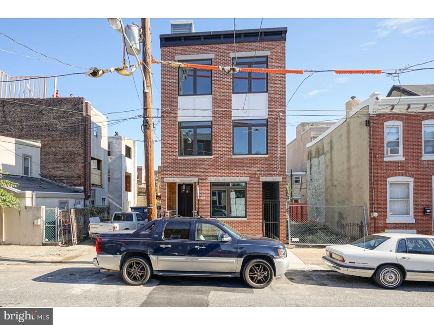 Beautiful New Construction home located on the Riverside of Fishtown.  Spectacular open floor plan with contemporary finishes throughout.  First floor features spacious living room, Eat in Kichen with granite counters, stainless steel appliances including slide in range, counter and table seating.  Second floor is master suite with sizable bedroom, ample closet space, and exit to rear balcony.  Third floor features two bedrooms, laundry closet, and ultra modern ceramic hall bath with huge stall shower and stand alone soaking tub.  Full finished basement with full bath.  Recessed lighting and hand scraped hardwood floors throughout. Awesome outdoor space which includes roof deck and rear yard with alley access. Ten Year Tax Abatement! Awesome location!  88 Walk Score!  Convenient to public transportation, Fishtown Library, Lloyd Whiskey Bar, Kraftwork, Interstate Draft House, and much more.