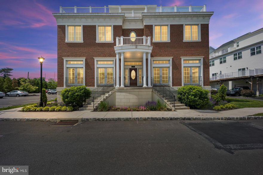 Overlooking the Delaware River, this remarkable Crown Jewel of a multi-generational home is a 2016 custom build and includes THREE RESIDENCES ready for new owners! The property has been meticulously maintained and is truly breathtaking. Begin in the main home with over 4,000 square feet; enter the foyer with an open floor plan to love. To your left, a magnificent oversized living room with fireplace, stunning box beamed ceilings, hardwood floors, and tons of natural light shining through premium custom windows. To your right, a lovely dining room to host the largest of celebratory gatherings with friends and loved ones. Giving the chef an amazing workspace, the New York style kitchen features high quality cabinetry, top of the line appliances, eye catching backsplash, hardwoods, wine fridge, and high ceilings, Leading upstairs, the primary bedroom boasts tray ceiling with crown molding, recessed lighting, walk in closet, gorgeous modern en suite with double sink vanity and unbelievably brilliant tiled shower to start your mornings right. Two additional oversized bedrooms await, along with a grand hall bath, and spacious laundry room with cabinetry. To the third floor, you will relish with a rooftop deck to view the marina and enjoy the fresh summer air. This floor also includes a convenient half bath. On the lowest level, a full finished basement with high ceilings is primed for work, play, reading, movie nights, and more. The custom bookcases are unique and gorgeous. This basement also includes a modern full bath. The two car garage is immediately ready for parking and storage. In addition to the primary home, you will enjoy two additional residences with their own private entrances. The 1-bedroom, 1-bathroom home is perfect for anyone looking to host a guest or have a family member enjoy their own space with a beautiful full kitchen. This residence also enjoys laundry, living room, and dining room. The 3rd residence will have you lost for words with an open floor plan including dining room, living room, and spanning kitchen with tons of cabinetry and countertop space. For retiring in the evening, enjoy three bedrooms, two of which have their own en suites. This level also includes a laundry room and full bathroom in the hall for an additional facility, while one more floor above features the 3rd bedroom. Location, location, location with the train station within walking distance, easy access to Philadelphia, Princeton, and New York City, the Pennsylvania Yacht Club, tons of shopping and top rated restaurants, major highways such as I-95, the PA Turnpike, and so much more. Don't miss all of the possibilities this home can hold for you, including leasing out the two additional units and offsetting your expenses for as much as $5,500 with monthly rental income!  Schedule your private appointment today!
