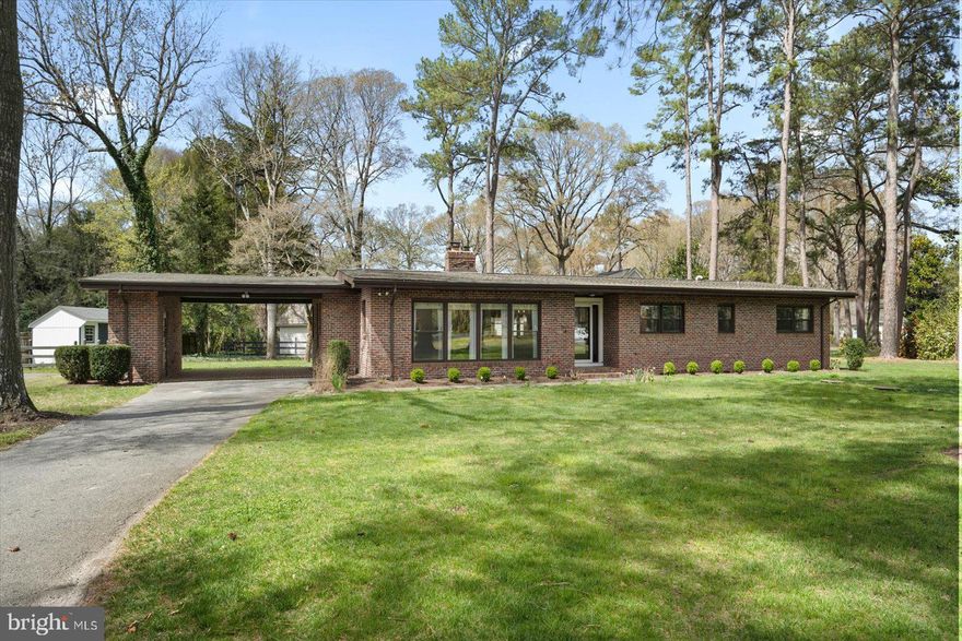 Located in Tony Tank and minutes from Salisbury University, Tidal Health and Downtown Salisbury, this updated, brick rancher is the perfect place to call home! Boasting a new kitchen...cabinetry, quartz countertops, tile backsplash, and stainless appliances (2024), updated bathrooms with recently replaced vanities (2024). as well as gleaming hardwood floors throughout, this 2196 SF, 4 bedroom, 2.5 bath residence is move-in ready! Other updates in 2024 include a new front door and storm door, heat conversion from propane to natural gas, repair/replacement of all PVC plumbing pipes, upgraded light fixtures in the kitchen, dining room, foyer and hallway, and a refresh of interior paint.  The home also features a masonry wood burning fireplace, screened porch. and a spacious unfinished partial basement with washer & dryer and loads of storage space. The yard has in ground irrigation, and the fenced back yard has a convenient garden shed. Enjoy the warm weather months ahead on the delightful screened porch and patio. An asphalt driveway leads to an attached carport w/ storage room, as well as direct access into the house. For peace of mind, all inspections have been recently completed, and reports are available for review. SEPTIC APPROVED FOR 6 FULL TIME RESIDENTS.