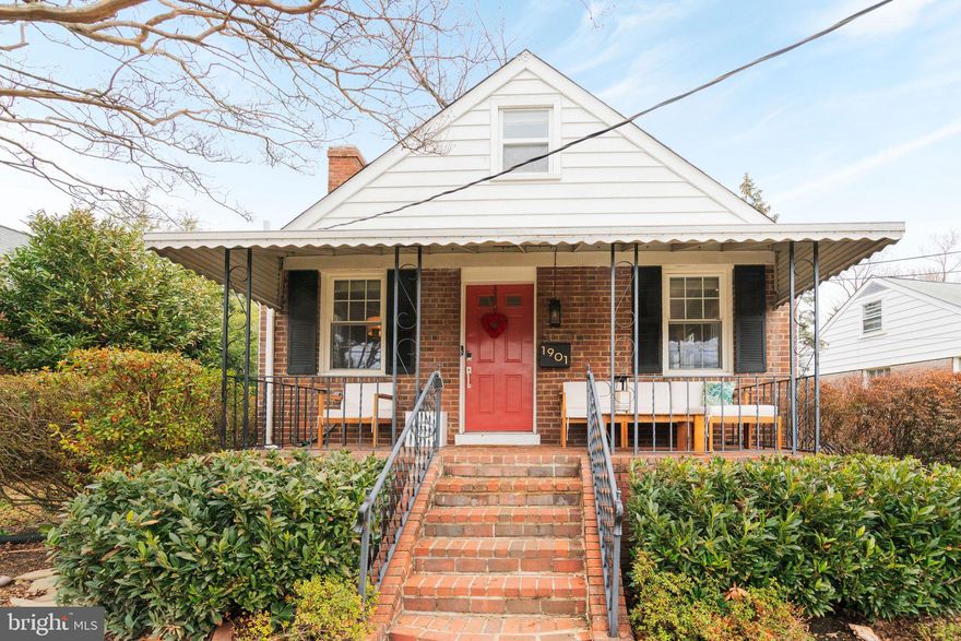 Nestled in one of Alexandria's most sought-after neighborhoods, this beautifully maintained and updated home effortlessly blends classic architecture, warmth, style, and livability from the moment you arrive.

Step onto the charming covered front porch — the perfect spot for morning coffee, a good book, or a quiet evening watching the seasons change. It's the kind of welcoming entry that makes a house feel like a home before you ever walk through the door.
Inside, natural light pours in, filling every room with a bright, airy ambiance that makes the entire home feel open and inviting. The sun-drenched living spaces create an uplifting atmosphere that simply has to be seen to be appreciated.

At the heart of the home, the fully remodeled kitchen delivers both beauty and function. Thoughtfully designed with modern finishes, updated cabinetry, and quality appliances, it's a space that inspires home cooks and entertainers alike — whether you're hosting a dinner party or enjoying a casual weeknight meal.

Rest easy in the two comfortable bedrooms on the main floor and enjoy two additional rooms or workspaces + storage space on the upper floor.  Downstairs, the finished basement expands your living space in all the right ways. Whether you envision a media room, home office, playroom, or fitness space, the possibilities are as flexible as your lifestyle demands.

Perhaps the crown jewel of this property is the expansive, private backyard — a rare find in Northern Virginia. Fully enclosed and lushly landscaped, this serene outdoor retreat offers endless possibilities for weekend gatherings, gardening, or simply unwinding in your own personal sanctuary away from the world.  And don't forget the convenience and flexibility of the unique brick garage space (currently setup as a home gym!).

Located a short walk from Chinquapin Park Recreation Center & Aquatics Facility, Taylor Run trail, and just minutes from Old Town Alexandria and the King Street Metro, the GW Parkway, and easy access to Washington, D.C., this is suburban tranquility with unbeatable location and convenience.

This isn't just a home — it's a lifestyle. Don't miss your chance to make it yours!
