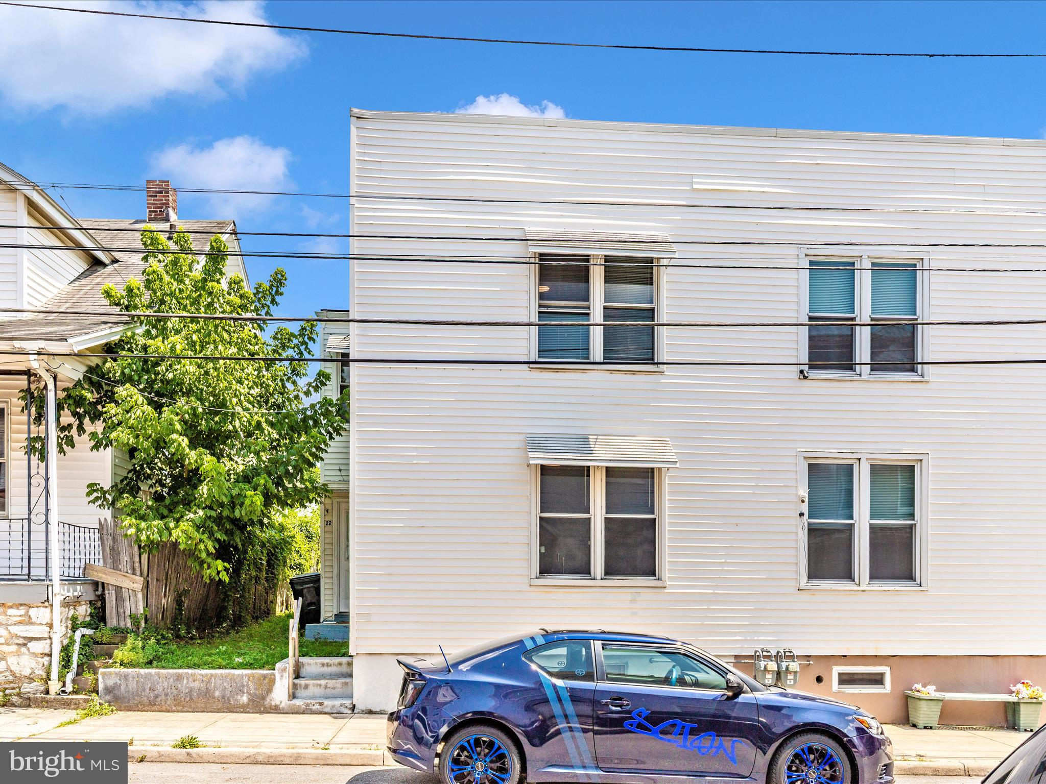 Affordable spacious half duplex in heart of Hagerstown. Two full baths and 4 bedrooms. Nicely updated kitchen, fresh paint and newer carpet. Off street parking in rear with alley access. Stop renting and start building some home equity! Professional photos will be uploaded later.