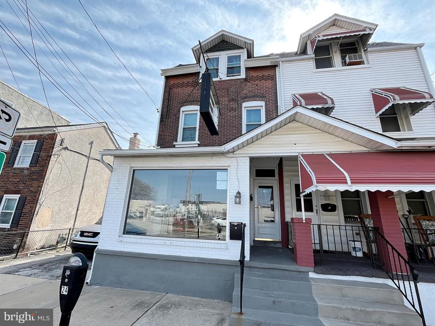 Prime commercial space for lease! Located in the heart of Bridgeport's main street, this unit ensures high visibility and easy accessibility for both foot and vehicle traffic. The unit boasts approximately 1,000 sq ft of adaptable space, suitable for retail, office, or service-oriented businesses. An additional 500 sq ft insulated garage provides secure storage or operational space, complemented by a basement offering extra storage capacity. Classified under Neighborhood Commercial (NC) zoning, the property supports a wide array of permitted uses, allowing for diverse business opportunities. With its prime location and flexible space, 40 E 4th St is poised to accommodate and grow your business!