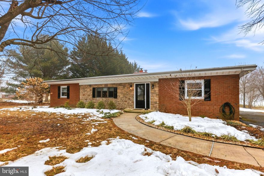 Ranch-style living in the heart of the Hereford Zone! This beautifully maintained 4-bedroom, 3-bath home sits on 2.68 scenic acres and features an updated in-ground pool (2023) and private pond. The main level offers spacious bedrooms, two full bathrooms, a bright living room, formal dining room, and kitchen with a granite-topped island that flows seamlessly for everyday living and entertaining. You’ll find two fireplaces, including a wood-stove insert added in 2023. The basement was fully refinished in 2025 with updated flooring and expanded living space. Outside, enjoy the Trex deck (2023) overlooking the property, along with extensive pool upgrades including a new filter and pump (2022), new coping, tile, and plaster (2023), and a new pool cover and salt cell (2024). Additional major improvements include a new exterior HVAC condenser (2019), front door (2020), well pump (2021), chimney (2025), and hot water heater (2026). Garage features include one attached with convenient basement access and a second detached garage at the end of the driveway. A rare opportunity to enjoy space, comfort, and sought-after Hereford Zone living!