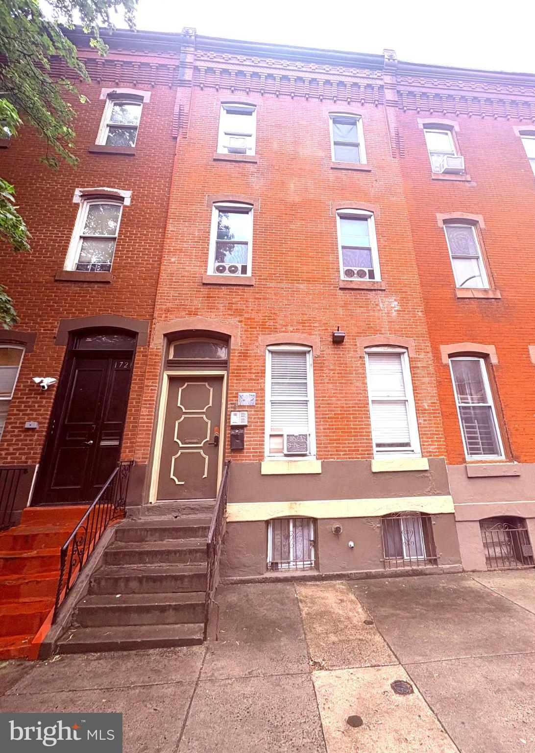CO-LIVING APARTMENT BUILDING - PRICE REDUCTION - Calling the savvy investor! Temple University, a fully occupied, exceptional Efficiency/Co-Living Apartment Building, thoughtfully designed to include 9 income-generating units, 8 modern baths, and 7 fully equipped kitchens. The amenities include a hook-up for washers and dryers. This upgraded co-living property is a prime investment opportunity for those seeking robust cash flow and long-term stability. With multiple units producing rental income, this asset outperforms traditional single-family or multi-family investments by maximizing revenue per square foot.
The property’s strategic layout minimizes vacancy risks while optimizing cash flow. Even if one tenant moves out, the remaining units continue to generate income, ensuring consistent returns. Additionally, the flexibility to offer short-term, medium-term, or long-term rentals allows investors to capitalize on shifting market demands, maintaining optimal occupancy rates year-round.
1730 W. Diamond Street is a standout investment purchase due to its significant 2024 upgrades, including modernized kitchens, enhanced bathrooms, and smart home features. With 9 rentable units, the potential income stream can significantly exceed that of a standard 4-unit quad or multi-family property. Plus, while a single vacancy in a quad can reduce income by 25% or more, this co-living building’s structure ensures minimal financial impact from tenant turnover.
Furthermore, the tenant pool for co-living properties is diverse and stable, ranging from working professionals and downsizing seniors to short-term residents seeking flexible, fully equipped living spaces. This broader tenant base not only reduces turnover but also minimizes costly repeat repairs often associated with conventional apartment rentals. This co-living property is not just an investment; it’s a strategic asset designed for sustainable, high-yield returns. Each unit is recently renovated. Cash deal preferred, as-is sale, and POF required before scheduling an appointment to see the property. Agent nor the seller is responsible for incorrect public information, including taxes. Showings are preferred during the Open House due to the tenant’s work schedules. CAP RATE Approximately 10%. Serious inquiries can request the rent roll. MLS does not allow for inputting accurate information regarding the number of kitchens. There are 9 recently renovated units, 8 baths, and 7 kitchens. Read the details of the listing for the set-up of each room. Annual income is approximate and based on current rent roll. Buyer encouraged to check with City of Philadelphia, L and I and public records to confirm all details about the property.