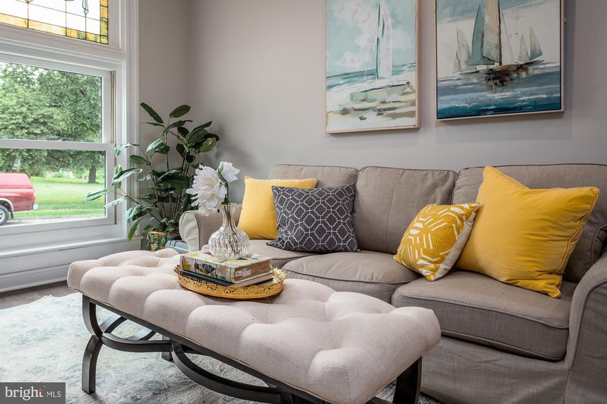 10 YEAR CHAP (based on $170,000 initial appraised value and is pending final approval) 3bedroom+DEN and 3 bathroom renovation with PARKING. Fully renovated with premium finishes, while preserving its historic beauty, this property features exquisite attention to detail. Open and inviting floorpan,  gorgeous tray ceiling, exotic matte finish solid hardwood floors, custom built-ins with reclaimed wood beams, two-tone chef's kitchen with incredible layout, Calcutta Venice  quarts counter tops, along with the trendiest architectural waterfall island. Second floor features incredibly spacious layout, with a large master suite, designer bath with Italian tile, custom niches, large walk-in shower, as well as a guest bedroom and bathroom, leading you out to a two-tier rooftop deck with incredible views of Patterson Park and Baltimore downtown skyline. Lower finished level offers a bedroom, full bathroom and a den with a walk out to the PARKING PAD in the rear of the property. Premium location on the park, close to all that Baltimore downtown offers, as well as an easy access to major highways.