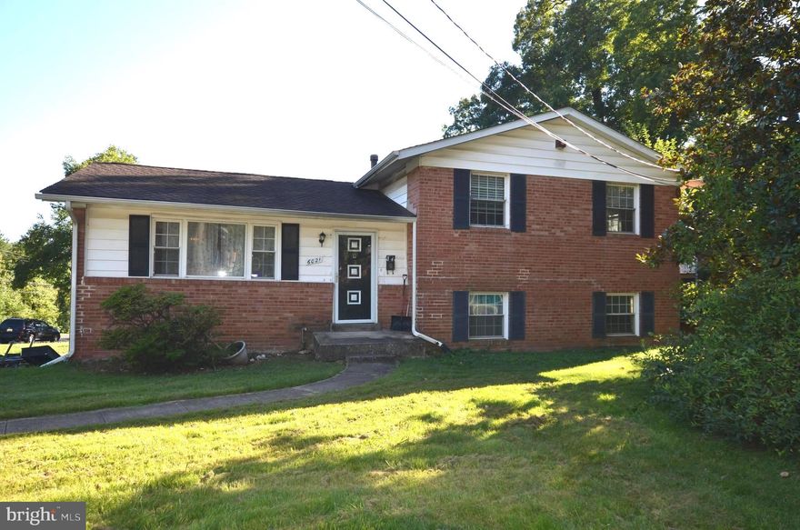 Spacious 4-level Split-Level brick single family home in Berwyn Heights. Open floor plan. 3 bedrooms, 2 full baths on upper level. Kitchen, living, and dining room on main level.  4th and 5th bedroom with full windows, 3rd full bath on lower level 1. Large recreation room, utility room on walkout, lower level 2. Hard wood floors on main and upper levels. Carpet on lower level 1. Ceramic Tile on lower level 2. Large deck with new deck floor, off dining room sliding door. New laminate floor in kitchen. Close to UM Shuttle and Metro Bus Stop. Seller will sell all furniture too.