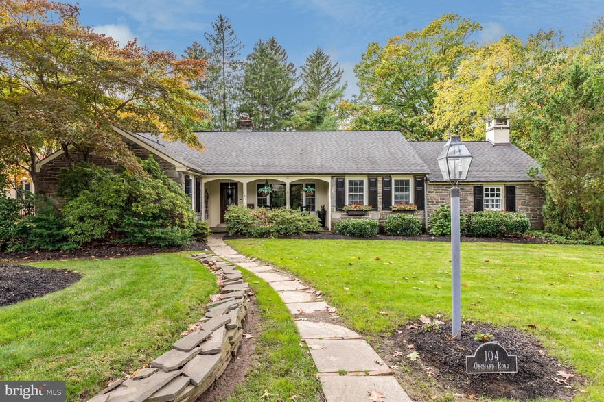 Professional Interior Photos Coming Soon! Have you been looking for a first-floor main bedroom? How about a stone ranch in the T/E School District? Would walk to train interest you? This lovely 3-bedroom, 2-bath home has all these features and so much more. Hardwood floors, two fireplaces, updated kitchen and baths, a large family room, extra wide molding, freshly painted inside and out (2021), brick-and-slate terrace with built-in grill, a separate two-car garage, and a fenced yard make this home the perfect choice. Welcome to the popular community of Valley Hills! You’ll appreciate this home’s great curb appeal with its mature landscaping, window boxes, curving walkway and a covered front porch. The entrance hall, featuring hardwood flooring and a coat closet, leads to a sunny living room with large windows, a painted paneled feature wall with a wood-burning fireplace, crown molding, recessed lights, and access to the terrace. The dining room has hardwood flooring, crown molding and chair rail, and large windows. The kitchen features stainless steel appliances, including a GE Monogram wall oven and cooktop, LG French Door refrigerator and Bosch dishwasher. granite counters and subway tile backsplash, a large stainless single-bowl sink with disposal, recessed lighting, a ceramic tile floor, and access to the backyard. Step down to the expansive family room with its propane-fired fireplace, built-in bookshelves, hardwood flooring, multiple windows with shutters and recessed lighting. The main bedroom has hardwood flooring, a ceiling fan, shutters, crown molding and a professionally installed closet system with drawers and hanging space; the en-suite bath has a pedestal sink, tile flooring, a tile shower and shutters. The hallway leading to the bedrooms has a linen closet with a professionally installed closet system and attic access. The second bedroom has hardwood flooring, multiple built-ins, painted paneled walls, crown molding, and a closet. The hall bath has a pocket door, tile flooring, a deep tub, a vanity with vessel sink, and recessed lighting. The third bedroom has hardwood flooring, multiple windows and a closet. The unfinished basement has a laundry area and plenty of room for storage. The fenced backyard features a slate and brick terrace with awning, stone walls and a built-in grill with granite surround. A separate two-car garage has vinyl siding and a single garage door with keypad. There is a garden storage shed. The home’s Paoli location means there is much to enjoy here, including the shopping and restaurants of the nearby towns of Malvern and Berwyn, as well as train stations that are close by and go directly to Center City. Beautiful parks such as Valley Forge National Historical Park are just minutes away.