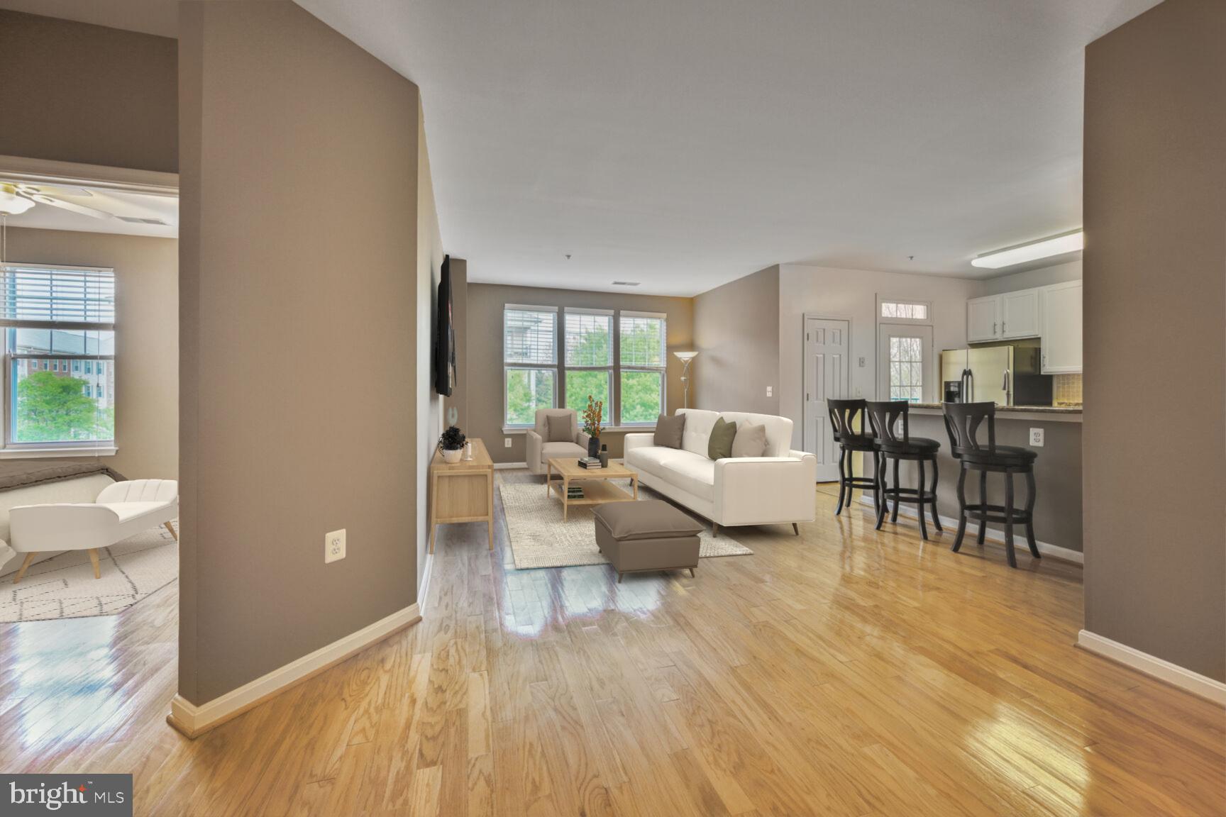 Price improvement! $435,000! Welcome to the Kentlands! This beautifully maintained 2-bedroom, 2-bathroom condo is located in a desirable elevator building, occupying a prime third-floor end-unit position. The home features gleaming hardwood floors throughout the main living areas and tasteful tile in the bathrooms.
The spacious primary bedroom boasts multiple closets, including a generous walk-in, while the second bedroom offers ample closet space and convenient access to the guest bathroom. Both bedrooms feature newly added ceiling fans, installed by the current owner for enhanced comfort.
Enjoy the functionality of a dedicated laundry area with a full-size washer and dryer, abundant storage space, and built-in shelving.
The thoughtfully designed floor plan includes a separate dining area and a private balcony just off the kitchen—perfect for morning coffee or evening relaxation. The kitchen is equipped with a gas stove, stainless steel appliances, and a newly replaced microwave (2024), along with plenty of cabinetry for storage.
Recent updates include a new water heater scheduled for installation in January 2025 and an HVAC system replaced within the past five years.,
Don’t miss this opportunity to live in one of the most sought-after communities in the area!