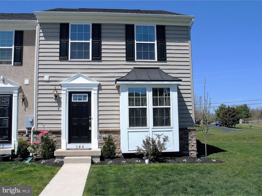 NEW PRICE for this home.  Move-in ready upgraded end unit townhouse in Windlestrae.  The moment you walk in you will find a home that has been tastefully decorated and meticulously maintained.  The main floor consists of a living room with crown molding, powder room, large eat-in kitchen with beautiful flooring, tile backsplash, Corian countertops and a generous size dining room filled with plenty of natural sunlight.  Relax in the master retreat and enjoy vaulted ceilings and an upgraded master bath.  The finished basement offers over 400 sq ft of additional living space that includes a custom bar and plenty of storage.  This home is conveniently located close to shopping, restaurants and commuter routes.  Why wait to build when you can enjoy this upgraded home that is ready for immediate possession?  This home also qualifies for 100 percent  USDA financing.  Schedule your appointment today, you won't be disappointed!