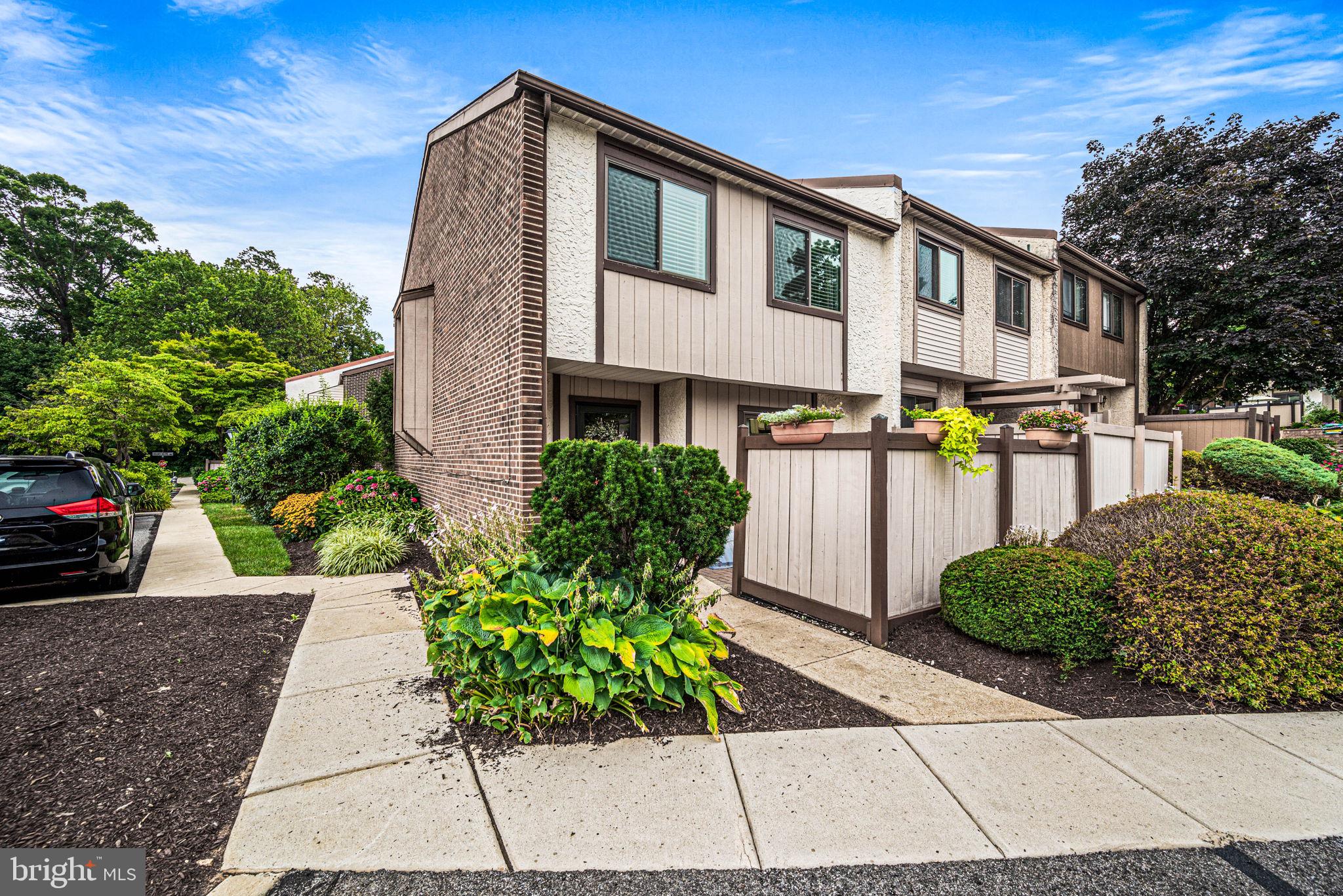 Welcome to 1801 Linden Way – a beautifully updated end-unit townhome tucked into the desirable Prussian Woods community of Upper Merion Township. This spacious 3-bedroom, 2.5-bath home offers over 1,580 square feet of stylish, low-maintenance living with open floor plan and thoughtful updates throughout. Built in 1979 and completely modernized, this home is move-in ready and perfect for today’s lifestyle. Step inside to find hardwood-style flooring, updated lighting, newer windows, and sliding doors that fill the space with natural light. The main level features a warm and welcoming layout with a sunlit eat-in kitchen boasting granite countertops, stainless steel appliances, a tile backsplash, and a convenient passthrough to the formal dining area. Sliding glass doors off the kitchen lead to a charming private front patio—ideal for morning coffee or outdoor dining. The spacious living room is anchored by a cozy wood-burning fireplace and opens to a rear patio, creating an easy flow for entertaining or simply relaxing outdoors. A stylish powder room and coat closet complete the main floor. Upstairs, you'll find a generous primary suite with two large closets and an updated en-suite bathroom featuring a stall shower and custom tilework. Two additional bedrooms offer great space for family, guests, or a home office, along with a sleek, updated hall bath and a convenient upper-level laundry area. The full basement provides excellent options for storage; a workshop or a home gym. This home is ideally situated near everything King of Prussia has to offer. Enjoy quick access to major highways, making for an easy commute to Philadelphia, West Chester, Conshohocken, and the Main Line. You'll be just minutes from exceptional shopping and dining at the King of Prussia Mall, or hiking and biking trails at Valley Forge National Historical Park. Located in the top-rated Upper Merion Area School District, this home offers the perfect blend of comfort, convenience, and community. OPEN HOUSE SUNDAY 8/3/25 1:00-3:00.