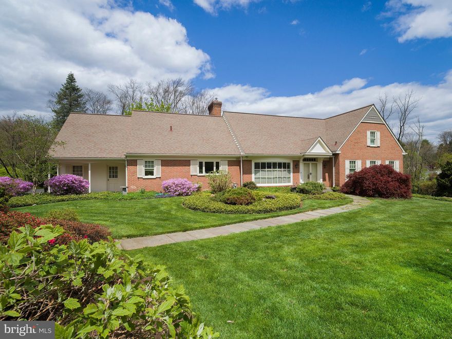Perfectly situated on a 1.45-acre lot, on a quiet cul-de-sac in a well sought Villanova neighborhood, you will find 1224 Lakemont Road. A lovely 5-bedroom, 5-bathroom (3 Full, 2 Half) home that is equipped with everything you want or need. Not only is the home itself wonderful but the neighborhood and proximity to nearby parks, and major highways add to the value of this already highly valued home. The lovely PA Bluestone walkway leads to the front door that opens to the bright and airy two-story foyer. To the left is the formal dining room with large windows that drench the space with warm natural light and overlook the expansive front yard. Off the dining room is the updated kitchen, which features granite countertops, plenty of maple soft-close cabinets, and stainless-steel appliances. The appliances include a Wolf 4-burner gas stove, and Kitchen Aid double ovens, built-in microwave, refrigerator, and dishwasher. The kitchen is spacious and well-maintained making cooking that much more enjoyable. From the kitchen there are doors leading to the side patio, as well as the wonderful, oversized attached 2-car garage with epoxy finished floors. The family room is open and sun-filled and includes a gas fireplace, radiant heat, and a powder room. This room leads to the back deck that overlooks the sweeping backyard with space to design the grounds to suit your needs. Relax on the peaceful deck and soak in the nature and outdoor space around you. This is the perfect place to spend warmer days: reading, relaxing, or catching up with family and friends. Back inside is the elegant formal living room with the second gas fireplace that will keep you warm on colder days. The first floor is complete with the first two bedrooms. The first bedroom is currently being used as an office and is well-sized with a deep closet and built ins. The second is the primary bedroom featuring two large closets with built-ins and a large ensuite bathroom with a double sink vanity, heated towel bar, stall shower and soaking tub. A full hallway bathroom completes the main floor. Upstairs are the three additional bedrooms which are well-sized and feature hardwood floors and deep closets. They share the Jack-and-Jill style full bathroom with a double sink vanity, bathtub, and stall shower. The upstairs hallway closet includes plumbing and could be easily converted into another bathroom, if desired. Open to the large unfinished attic space that is perfect storage space or could eventually be converted into additional living space. The cozy lower level has so much to offer with a wet bar great for entertaining, a powder room, photo lab, and huge back storage room. The lower level is perfect for a game room with its pool/billiard room, an at-home gym, entertainment space, or extra living space to sit back and relax by the gas fireplace. Additionally, there is a full house generator. From the lower level you can exit to the back patio which is a great space to grill when the weather gets warm. This home is filled with so much character and has been meticulously cared for and loved. With its lovely sun-filled indoor living spaces and its expansive grounds, all while in a highly desired neighborhood, this home will be a pleasure for its new owners!
