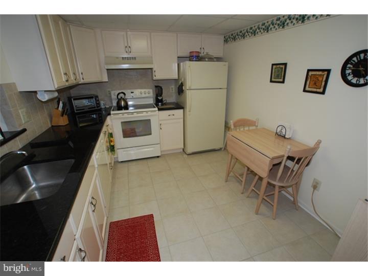 Priced to sell! Perfect condition. As good as it gets. Biggest 2BR on top floor of connected atrium building with courtyard views. Extensive ceramic flooring even on the balcony. GRANITE kitchen counters. Upgraded kitchen and bath cabinets. Once inside, you'll be treated to a large rancher-like home at Centennial Station (55+ Luxury Living). You'll also discover very generous room sizes, especially in the tiled eat-in kitchen with upgraded cabinets and room for a 4 seat kitchen set. Very bright and cheery with double-hung vinyl windows. All that and it's located in one of the few Buildings That Is Connected To the Extensive Activity Center Including Indoor Year-Round Pool, Exercise Room, Craft Room (With Kiln), Card Room, Billiard Room, And Meeting/Banquet Room. Commercial Wing Of Activity Center Boasts Hair Salon, restaurant,Dentist, and Real Estate office. Construction Features Include Solid Concrete/Cinder block Construction, Sprinklers and Security System. Large Otis elevator. Fee includes cable tv, security monitoring, water, sewer, trash, snow, insurance, and activities. Only one resident has to be 55 as long as others are 19 or older.