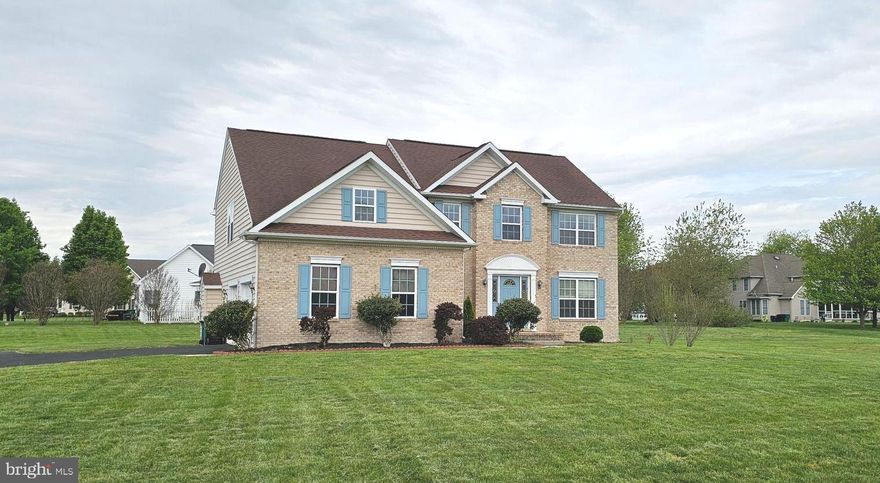 Elegant and affordable!! This stately brick-front Colonial in the Village at Wild Quail delivers timeless style and everyday comfort in one exceptional package. From the moment you enter, the dramatic two-story foyer with its open staircase sets the tone, flanked by a spacious sitting room that offers flexibility for formal living or a quiet retreat. The heart of the home is the expansive rear living space, where a beautifully appointed kitchen features granite countertops, a large center island, stainless steel appliances, and a bright eat-in area. Designed with entertaining in mind, this space flows seamlessly into the inviting family room, complete with a cozy gas fireplace and direct access to the backyard—perfect for gatherings both indoors and out. A formal dining room adds an elegant touch for hosting special occasions. 
Upstairs, the generously sized primary suite offers a private escape with a full bath and walk-in closet. Three additional well-proportioned bedrooms and a shared hall bath provide plenty of room for family, guests, or a home office setup.  Additional highlights include a full basement offering endless potential, a two-car garage, and a spacious lot just under an acre—ideal for outdoor living, gardening, or simply enjoying the open space. This is a rare opportunity to own a refined home in a sought-after community without compromise. ** Additional work being completed in the very near future and professional photos coming soon!  Call for additional information.