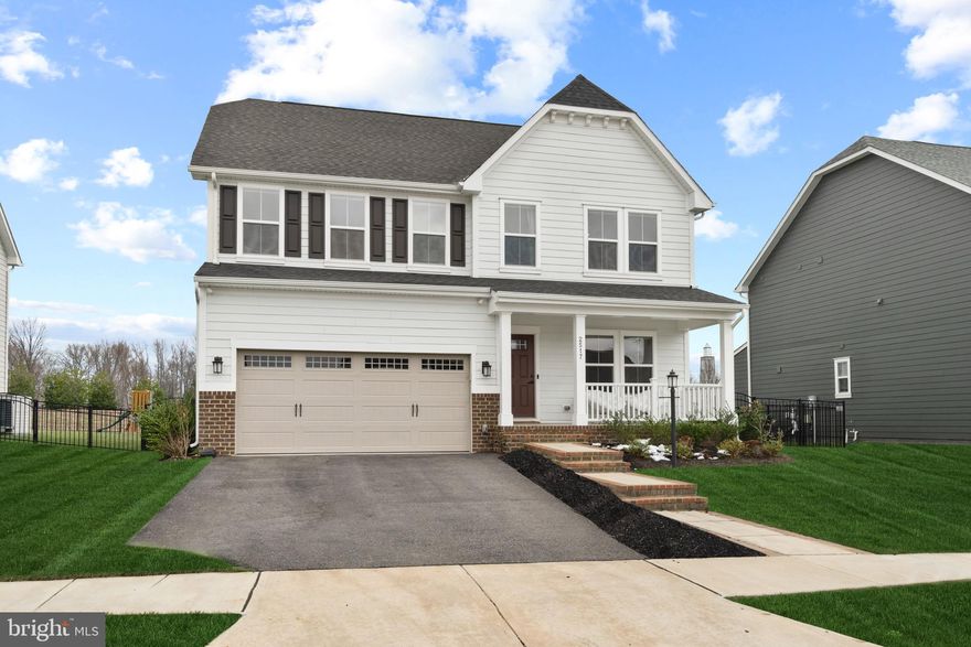 Welcome to this beautiful home in sought after Potomac Shores! This gem shows like a model home, the Milan floor plan features an open floor plan perfect for gathering and entertaining. On the main level you will find an office, dining room, gourmet kitchen upgraded with white cabinets,  granite countertops, white backsplash, stainless appliances to include a gas stove,  an oversized island, and a family room that sprawls across the rear of the home with access to the stunning brick patio outside. Upper level features 4 bedrooms with a luxury owners suite,  his & her walk-in closets, and a laundry room.  A rocking basement with the ultimate entertainment space, whether you're a sports fan or a movie buff, this is the space for you, wet/dry bar, rec room, gym (that could be used as 5th bedroom), full bath & storage area. 
Potomac Shores is a resort style living community with activity and event for all ages, lots of amenities to include: sidewalks, five miles of nature trails with five more to come, two pools with a third coming in the near future, new schools, 18-hole Jack Nicklaus public golf course, marina, The Social Barn and Fitness Barn at The Shores Club. Future town center and VRE still to come!