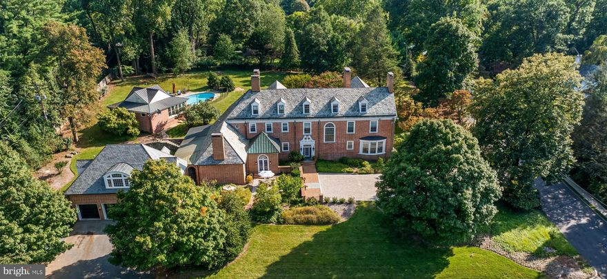 Experience Timeless Elegance, Elevated for Modern Living

Welcome to 20 Blythewood Road—an extraordinary Georgian estate blending classic architecture with refined modern luxury. Set on 1.58 acres of meticulously landscaped grounds in one of Baltimore’s most prestigious enclaves, this iconic 1926 residence offers over 7,600 square feet of sophisticated living space.

Inside, you’ll find six bedrooms, five full and two half baths, and a layout designed for both grand entertaining and intimate living. Highlights include a marble entry hall, multiple fireplaces, a chef’s kitchen butler's pantry,  and a climate-controlled wine room. The sunroom, library, and formal living and dining rooms showcase elegant millwork, hardwood floors, and classic detail throughout.

The second-floor primary suite is a retreat of its own—with a sitting room, private office, fireplace, and spa-like bath featuring a steam shower and jetted tub. Additional floors offer bonus rooms, a cedar closet, and flexible space for guests or staff.

This property offers resort style living with a heated oval pool, sunken garden, and a pool house complete with a gym, media room, and full bath.  A spacious four-car garage also includes a private guest apartment with two bedrooms and two full bath-ideal for extended stays, a home office or multi-generational living. 

Rich in history and prestige, this estate is now ready for its next chapter.
 ** Measurements, Room Count, and Bath Count include Main Residence Only***