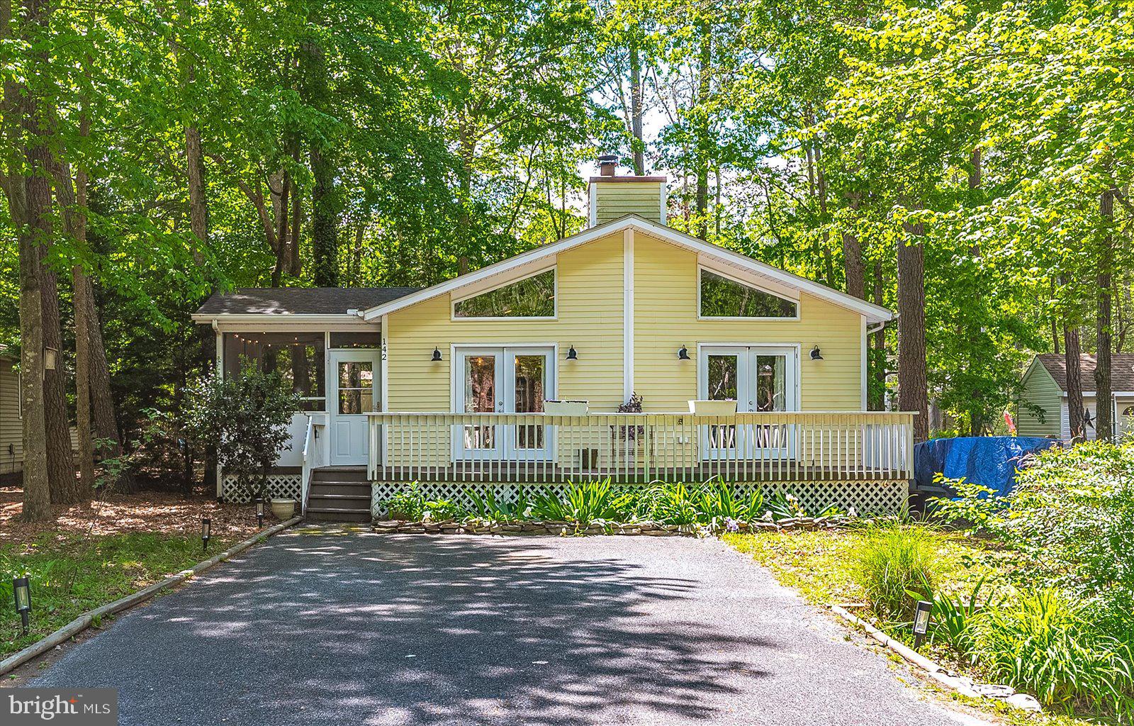 This 3 bedroom, 2 bath turn-key home has been well maintained and loved since being completely renovated in 2018, which included a new roof, HVAC and duct work, kitchen with self-closing cabinets, stainless appliances, and granite countertops, updated bathrooms, flooring, fireplace surround and water heater. Exterior features include a large fenced in yard with a back deck and storage shed, a cozy screened in porch off of the kitchen and an encapsulated crawlspace with a dehumidifier.