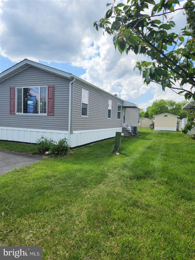 2BR/1BA single wide mobile home provides 930 sq ft of living space in the very quiet Williams Estates Mobile Home Park. The covered porch provides space for outdoor enjoyment as well. Refigerator, stove, dishwasher, washer, dryer and shed are included with the sale. BUYER MUST GET PARK APPROVED