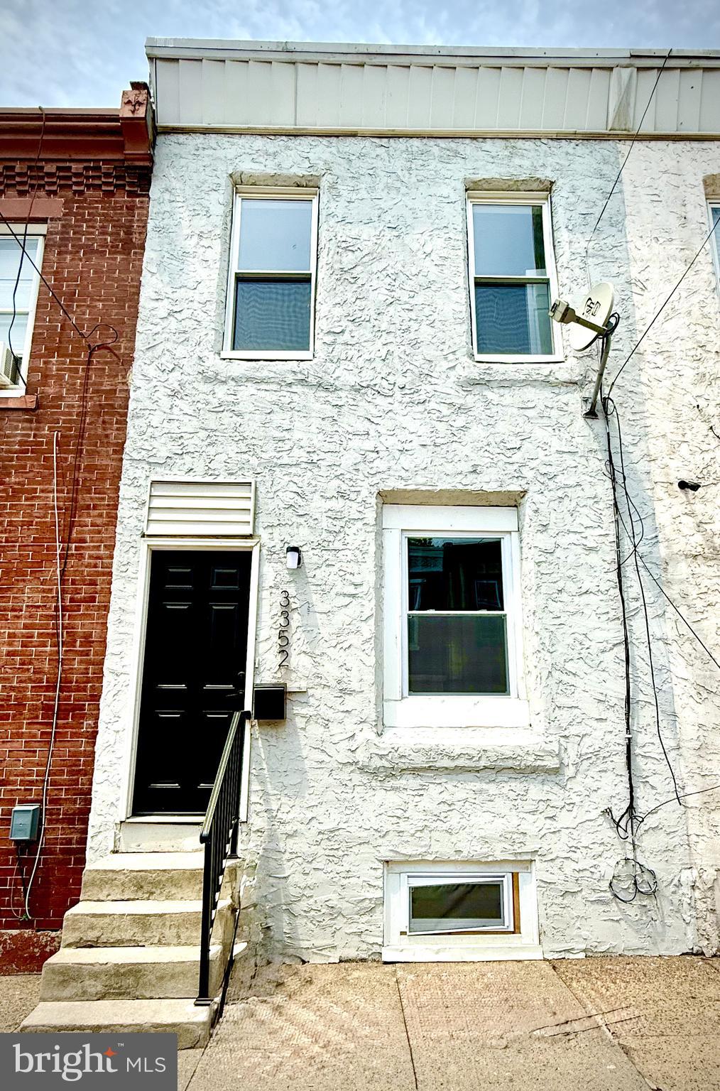 **Now is the time to take advantage of owning a meticulously elevated property with hand-picked premium upgrades, designer finishes, and newly refreshed back yard in the 19134 zip code!** 3352 Amber Street is not your traditional row home! Approaching the front of the property you will notice new windows, a sleek black railing, and new coordinating address numbers for that added modern touch! Enter into a refreshed, yet still keeping that Philly feeling, nearly 1,000 sqft living space with laminate wood flooring with an earthy feel combined with an exposed brick wall leading you to the staircase. This quaint space has been maximized to provide you with just the right amount of living space, dining room area, and the best part of this all is the front facing sink overlooking all of this. Approach a beautifully redesigned kitchen showcasing, but not limited to quartz countertops with a cascading waterfall edge at the sink and breakfast nook, new shaker cabinetry, a stainless steel appliance package, and an ornate backsplash, tying everything together. Counter space, custom shelving, and enough space for all of your entertaining and dining purposes is what you will find! Access to the newly refreshed, back yard patio can be done right from the kitchen. This beautiful, quaint space offers just the right amount of back yard for you to customize, make it your own, and entertain and enjoy! Utilize this private space as you entertain and show off everything you love about your house! Make your way upstairs and you will discover two nicely sized bedrooms, including a front facing master bedroom with another exposed brick accent wall, giving you that nostalgic feel that everyone loves in Philadelphia! Custom closet space has been added into this room as well as handpick moldings and recessed lighting throughout! If you’re looking for a luxurious bathroom with ceramic tile throughout as well as a conveniently placed washer and dryer: I invite you to explore the full bathroom, which has been glistened and shined with some of the latest amenities that homebuyers are seeking, including a fully ceramic tiled space, tiled shower/tub, and a country barnyard door giving you access to the in-bathroom washer and dryer! No detail has been overlooked on this second floor! The lower level of the home has your full basement, which has been smoothed and cleaned for all of your storage purposes and mechanical systems. Families, mothers and their children can take advantage of the walkability of the neighborhood, including the proximity to the all of the local shopping centers in the immediate area with Shoprite, Walmart, and Target, and nearby community space home to Sacred Vice Brewing and YAY CLAY, but not limited to all of the authentic Polish cuisine as well as restaurants and bars throughout Port Richmond and the surrounding areas! Explore all that Aramingo Avenue has to offer you, as well as a short commute over to the ever sought after Fishtown neighborhood as well as a short commute to downtown Center City. **This property qualifies for the city's My First Philly Home grant for up to $10,000 towards your closing costs.** Consider adding seeing 3352 Amber Street to your list of properties today!