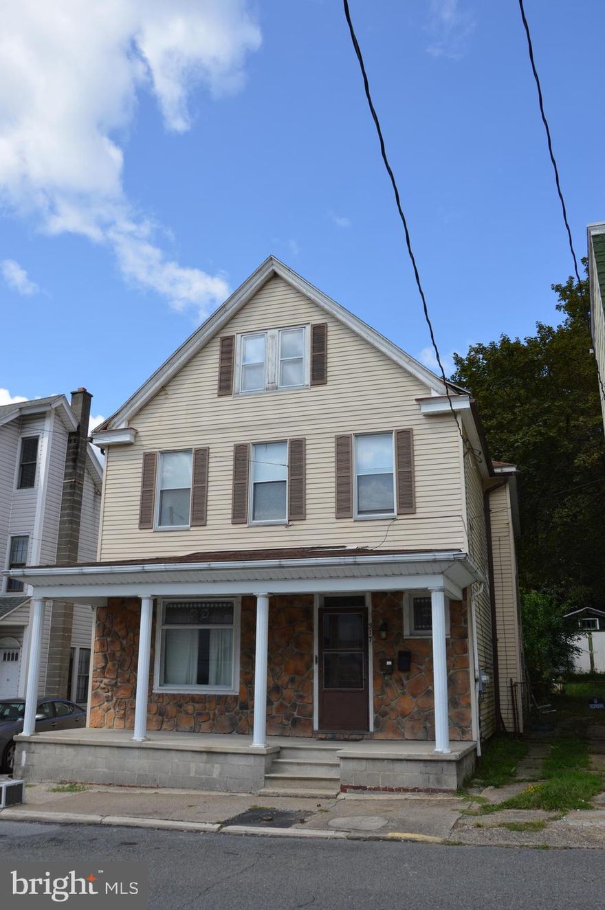 Well maintained detached duplex.   First floor occupied by a long term tenant.   Second floor currently vacant but ready to be rented.   Additional living space on third floor.  Hardwood flooring, arched doorways, wooden pocket doors, and stained glass windows add charm to this property.  Off street driveway parking for 1-2 vehicles.  Tenant responsible for separately metered electric.   Property is NOT located in the flood zone.  Perfect for an owner occupant with rental income.