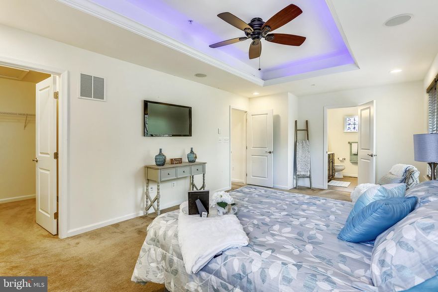 Beautiful custom home with peaceful patio waiting to be yours! This two story home has 3 bedrooms,  2 full bathrooms and a loft on the upper level that can be used as a den or office.  The main level kitchen, living room, and dining area are open, spacious, and bright. Stainless steel appliances compliment the granite counter tops. A parlor, laundry room and a half bath complete the main level. Inviting custom patio that backs up to a small conservation area adds privacy and shade. No extra charge for the turtle family! The lower level has been fully finished with a wet bar area and a full spa style bathroom which includes a 6' spa tub.  An integrated Bluetooth sound system , sprinkler system,  alarm system, and video doorbells make this home tech friendly and convenient.  Since there have been no pets occupying this home, it is allergy friendly too! Make this your new home, sweet home! Watch the tour https://youtu.be/VkwM87IZxxQ