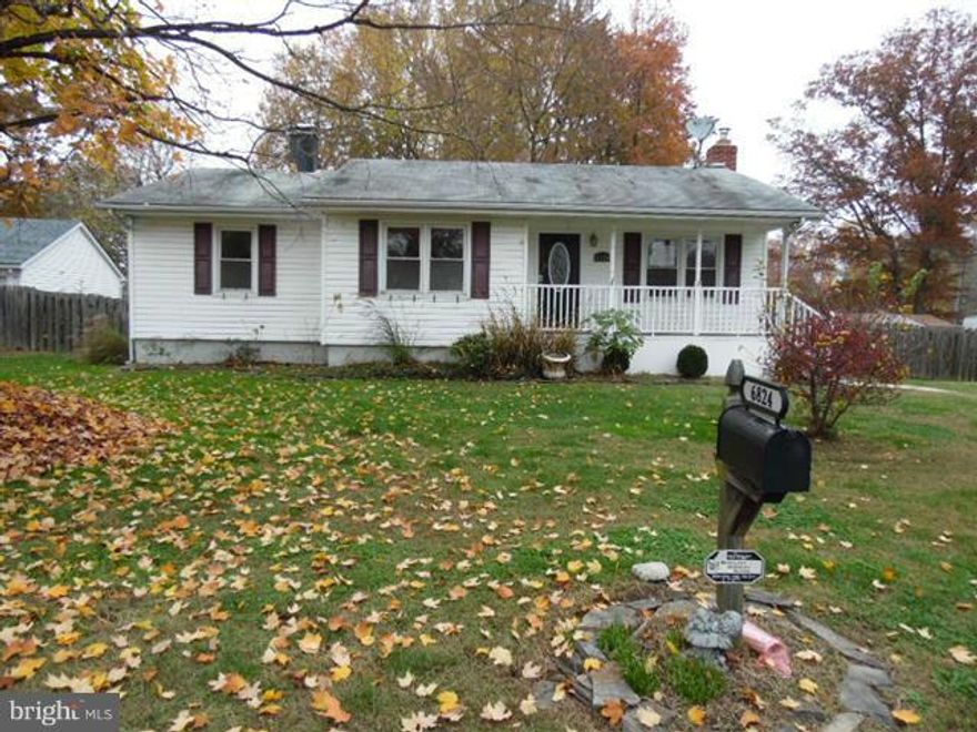 Spacious Rancher in Harewood Park features off street parking, covered front porch and side deck. Privacy fenced huge back yard has in-ground pool & shed. Main level has master bedroom with private bath & bedrooms 2 & 3 and full bath. Hardwood floors in living room & ceramic in Country Kitchen. Lower level is finished with family room and woodstove . Lots of storage & 1/2 bath. Community boat ramp