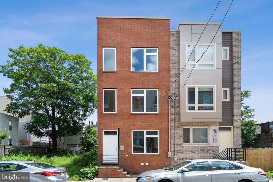 Fantastic five year old newer construction home in Point Breeze, just steps away from Center City! This is an exceptional value with 4 bedrooms, 3 baths, hardwood floors throughout, finished basement, 5 year tax abatement, and two outdoor spaces perfect for entertaining. This home offers an open floor plan with a large living room, an updated kitchen featuring quartz countertops, stainless steel appliances, cabinetry, breakfast bar, and a door leading out to a large rear yard. Up the stairs are 3 spacious bedrooms, 2 full baths with tiling, a large master bedroom suite, and rooftop deck with city skyline views. The finished basement offers a perfect place for a family room, office, exercise room, or additional storage. Located in one of Philadelphia's hottest neighborhoods, this home is just steps away from On Point Bistro, American Sardine Bar, Chicks, Bergs Hideaway and is in close proximity to Target, Sprouts, public transportation and more! A truly special home - don't miss!