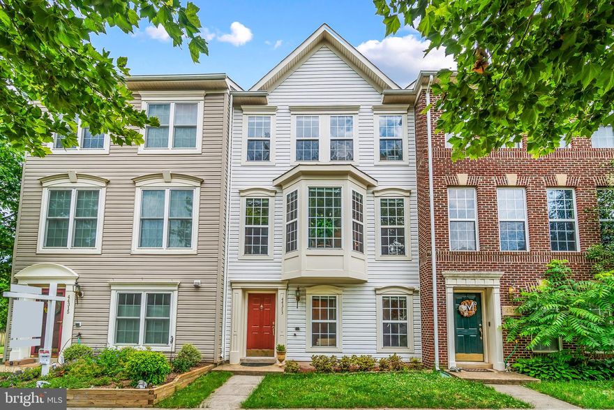 Bright and light filled 3 level TH with 3 beds, 2.5 baths, 2-car garage in amenity filled Ashburn Village. Open main level with bay window in living/dining room, eat-in-kitchen, family room, and deck backing to W&OD trail. Primary suite with dual vanities, soaking tub, separate shower and walk in closet. Lower level has office/den and guest parking behind townhome.  All 3 levels have wood laminate floors except stairs are carpet.  Close to commuter routes, shopping, restaurants, schools, and last stop of Silver Line Metro.  Don't miss out on this Ashburn Village home!