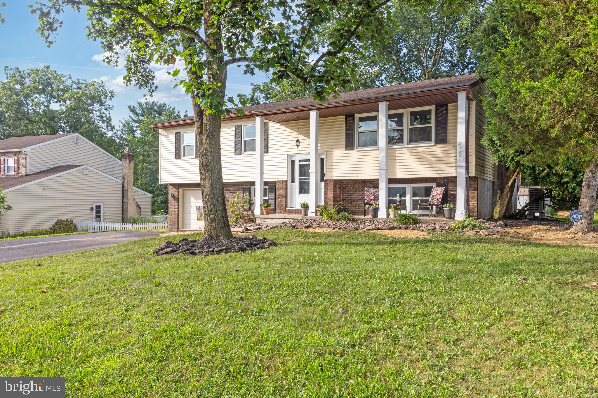 Updated Bi-Level Gem in Perkiomen Valley School District!
Looking for something beyond the typical colonial? This beautifully updated bi-level home offers comfort, character, and space—nestled on a quiet cul-de-sac and surrounded by mature trees for a peaceful setting.
Step into the open-concept main level featuring hardwood floors, a bright living area, and a stylish eat-in kitchen with granite countertops, cream cabinetry, and elegant lighting. Upstairs, you'll find three bedrooms, including a spacious primary suite with an en suite bath featuring updated tile (2021). A new vanity (2025) enhances the hallway bathroom.
The lower level provides flexible living space with a fourth bedroom, a large family room, a cozy wood-burning stove, and a built-in dry bar—ideal for guests, in-laws, or entertaining.
Major updates include:
New roof (2022)
New HVAC system with 10-year warranty (2025)
New windows (2022)
Updated deck boards and railings (June 2025)
Fresh interior paint throughout (July 2025)
Some closet doors replaced (July 2025)
Tile in primary bathroom (2021)
New vanity in hallway bathroom (July 2025)
Located in the desirable Perkiomen Valley School District, this home is move-in ready with thoughtful updates already complete.