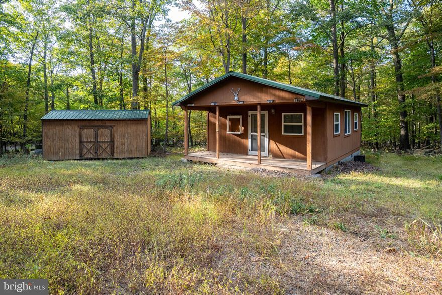 Hunter’s retreat with room to roam. A rustic cabin set on 102 acres of wooded rolling mountain terrain, with trails weaving through open feed clearings, and space that’s been prime ground for generations. Well and septic in place. The Forestry Stewardship Plan keeps taxes next to nothing, with the option to carry it forward. Quiet, raw, and untamed. Whether you’re looking for a hunting camp, or personal bugout retreat—this property can do it all! Call today to book your private showing.
