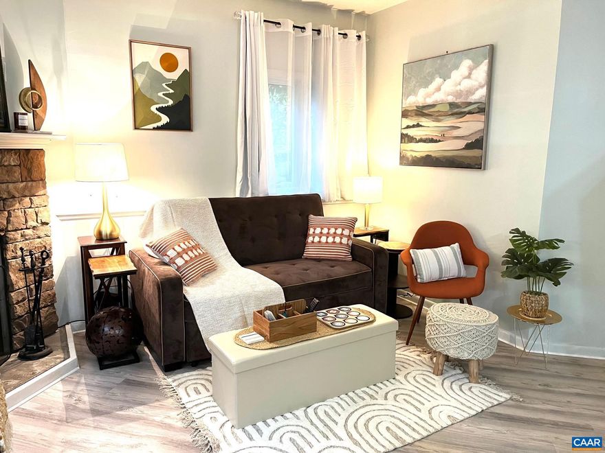 Lowest Condo Dues at Wintergreen! Nestled in the picturesque Wintergreen Ski Resort, this charming one-bedroom condo offers a perfect blend of modern comfort and rustic charm. Recently renovated, the condo features beautiful new flooring throughout, New furnishing, and new kitchen:equipped with modern appliances and ample counter space.The living room boasts of a cozy fireplace, ideal for warming up after a day on the slopes or enjoying a relaxing evening in. The bedroom is a tranquil retreat, featuring a comfortable bed, tasteful decor. The back porch is great if you have a dog, open to a back yard or a quiet place to have your AM coffee. One of the condo's standout features is its prime location. Just a short walk to the slopes!,Fireplace in Living Room