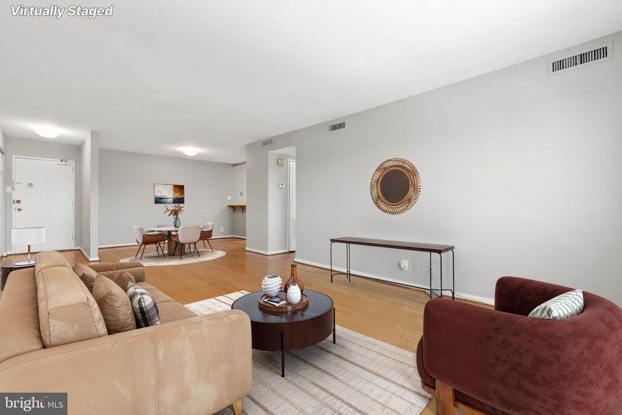 WELCOME HOME!
A rarely available 1BR, 1BA residence on the 10th floor at Whitehall Condominium that offers  sweeping views of Bethesda through oversized windows that fill the home with natural light. The open spacious living room features beautiful wood flooring and a wall of windows that lend a bright and airy feel. The open kitchen showcases quartz countertops, stainless appliances, and a gorgeous mosaic backsplash—perfectly blending style and functionality for everyday culinary entertaining experiences. Fresh coats of paint enhance the home’s crisp, move-in ready appeal. A large closet provides excellent storage, while the updated bath offers a clean, comfortable retreat for relaxation.Located exactly one mile from vibrant and highly sought-after Downtown Bethesda, convenience is truly at your doorstep. Whitehall offers professional on-site management, a fitness center, outdoor pool, private storage unit, and laundry facilities on each floor. The unit includes two parking spaces in the sprawling lot, and one all-inclusive monthly fee covers utilities—delivering exceptional value and easy downtown living.