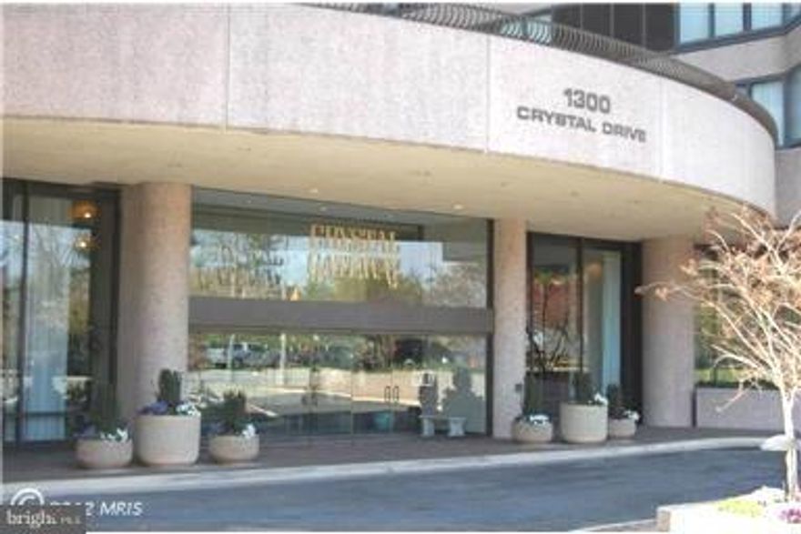 Great views from this 16th floor large 2 bedroom condo with updated kitchen with granite and SS appliances & hardwood flr. All marble master bath with doubles sinks,huge soaking tub,sep shwr & bidet.Deeded parking space in garage and storage room.This building  connects to the Crystal underground,shopping,restaurants and metro without going outside. 1 stop to Reagan Airport. Many amenities 2 pools