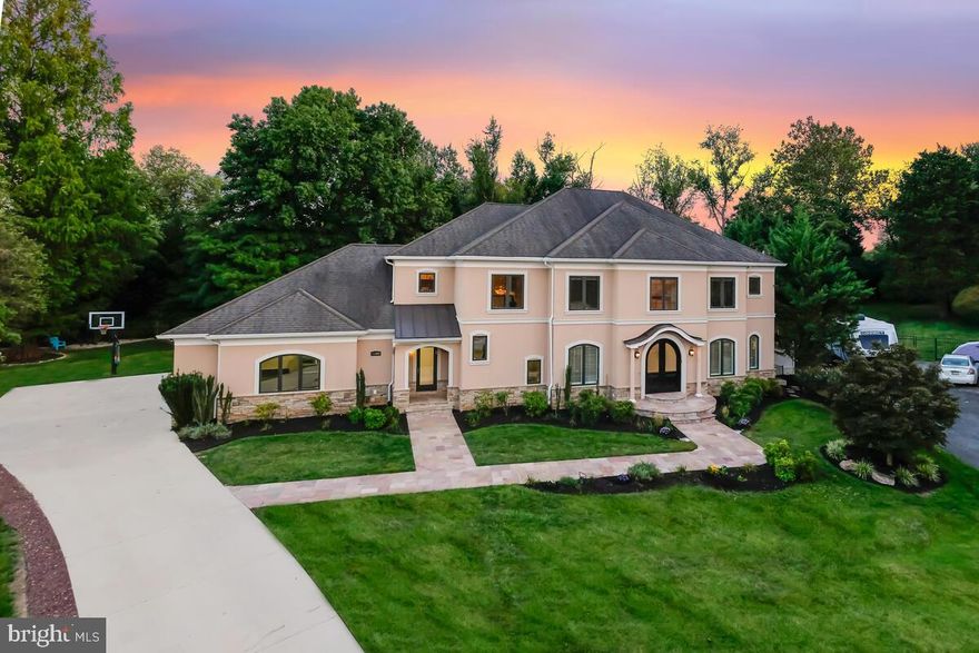 Welcome to your Mediterranean-style oasis in the heart of Potomac!  This luxurious home is beautifully situated at the bottom of a quiet cul-de-sac in the highly desirable Willerburn Acres community with 7 bedrooms, 5.5 bathrooms, a fully-finished walk-up basement, and an attached 3-car garage.

As you approach the property, you'll be greeted by lush landscaping and a custom double door entrance sets the tone for what's inside.  Enter and feel yourself drawn into this home's enchantment with its modern elegance and attention to fine architectural details including high ceilings and archways.  Large Pella windows welcome an abundance of natural light that enhances the immaculate dark wood flooring throughout.  Living and dining spaces of palatial size are embellished by decadent fixtures and the open-concept layout seamlessly traverses from one space to the next.  Ideal for entertaining or more intimate living, this home has a tremendous amount to offer inside and out.  

The gourmet kitchen is a chef's dream featuring top-of-the-line, built-in stainless steel appliances and premium cabinetry.  Appliances include an enormous side-by-side Kenmore refrigerator, a six-burner gas range, two deep sinks, and a built-in double-wall oven for all your culinary endeavors.  
The family room enjoys a fireplace and easy access to the deck and screened-in porch.
An enormous living room with a gas fireplace and built-in bookshelves is adjoined by an equally as impressive dining area, creating the perfect hub for hosting large gatherings.
On one side of the home, a second entrance opens to a mudroom with laundry facilities and a walk-in storage closet.  The main level is complete with a powder room and a main-level office, perfect for hybrid or work-from-home professionals.

Ascend up one of two staircases to the second floor and discover 5 very generous bedrooms and 3 full bathrooms.  The primary suite enjoys isolated temperature control with its own thermostat and an integrated speaker system with surround sound ready to be connected.  The luxurious spa bathroom has a huge frameless shower stall with a steam feature, a jacuzzi tub, dual sinks, a separate commode room, and a huge walk-in closet.  
Each bedroom has custom closet organization systems and one of the bedrooms passes through to a large bonus space that could serve as a game room or dressing room.  The upper level is complete with a full laundry room equipped with a sink, cabinetry, and countertops for your convenience.

The sprawling lower level is sure to impress, designed to serve family and guests with an abundance of space for recreation and living.  A home theater system with surround sound and a wet bar/kitchenette are amazing features for all to enjoy.  There is a huge bonus room, a bedroom, a full bath, and tons of storage space.  

Step outside and enjoy your private backyard oasis.  Shaded by mature trees, the fenced-in yard space, expansive deck, and screened-in porch create the perfect atmosphere for all of life's finest moments.  The location is unbeatable, situated in the award-winning Churchill school cluster with shopping and dining options just minutes away.  Convenience to I-270 ensures that everything you need is within easy reach.  Don't miss the opportunity to make this Mediterranean masterpiece your new home.  Experience the beauty and charm of 11800 Greenleaf Ave for yourself!