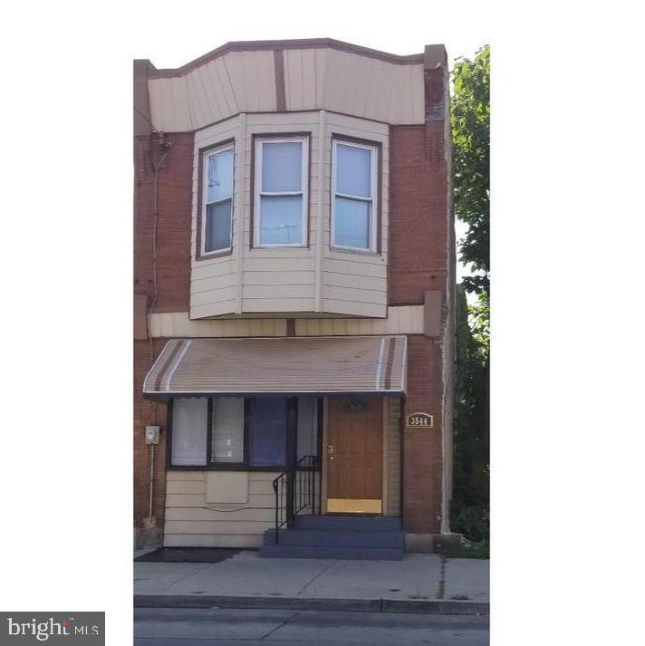 This four-bedroom detached home is a couple of blocks from Temple University Hospital. The primary bedroom with an en suite bathroom is on the main floor. Very high ceilings, overhead lighting, vinyl, and laminate flooring are located throughout the home. The kitchen has a tile backsplash and updated cabinetry. The second floor features three bedrooms and another full bathroom. The heater and electrical panel were replaced in 2018. Large unfinished basement. Sold As-Is.