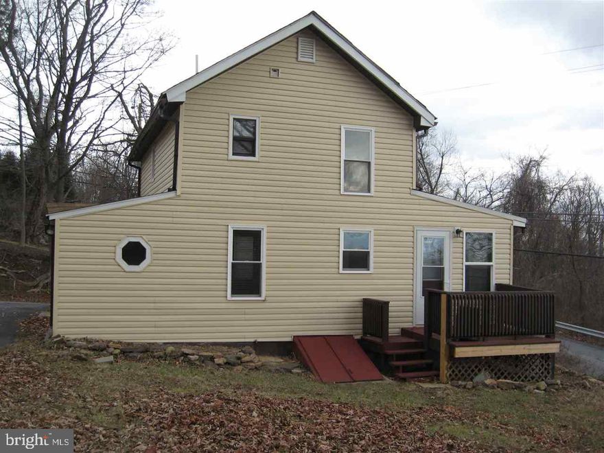 "0" down payment for qualified buyer using USDA financing. Cozy 2 bedroom home w/ 1st floor laundry. New carpet, paint & other recent improvements. 1st floor features an open 12x23' living room/dining room combo w/ french doors leading to a heated 9x23' sunroom that could be used for a family room/play room/office. U-shaped kit w/ electric range, fridge, small island & new vinyl floor. 2nd floor has 2 BRs & refurbished bath.  Basement has exterior access. Small shed. Deck. Off street parking at rear door.