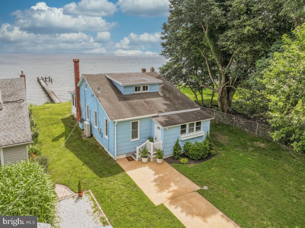 Waterfront Paradise Awaits at 305 Bay Front Dr, Pasadena, MD
Tucked away on the sparkling shoreline of the Chesapeake Bay, 305 Bay Front Dr is more than a home — it’s a lifestyle. This rare waterfront gem in Pasadena, Maryland offers breathtaking panoramic views, direct Chesapeake Bay access, and a 300-foot private pier that alone is valued at over $300,000. If you’ve been dreaming of owning a slice of the Chesapeake, your opportunity is here.
This fully renovated coastal retreat features 3 spacious bedrooms and 2 full bathrooms, thoughtfully designed for comfort and convenience. The spacious primary suite occupies the upper level. On the main level, you’ll find two additional bedrooms, one of which is generously sized and perfect as a second primary bedroom or luxurious guest quarters.
The home is truly turn-key based on recent renovations complete with recent systems and roof. Whether you’re seeking a full-time residence or a seasonal sanctuary, all that’s missing is your personal touch.
Step into the fully enclosed sunroom, a light-filled haven that expands your living space and offers floor-to-ceiling water views in every season. It’s the perfect spot for morning coffee, reading, or hosting unforgettable gatherings.
Outside, your private pier awaits — impeccably maintained and ready for your boats, jet skis, crab pots, or peaceful evening strolls above the bay. Imagine watching the sunrise from the end of the dock or casting a line with loved ones on a warm summer night.
Homes like this don’t come along often. The views from both the home and the pier are nothing short of spectacular — photos won’t do it justice. If you’ve been searching for the perfect waterfront home that offers privacy, functionality, and elegance with direct bay access, 305 Bay Front Dr is calling.
Schedule your private showing today and experience the magic of the Chesapeake firsthand. This one won’t last long.