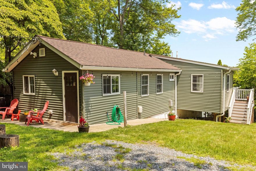 Never before offered for sale, this adorable waterfront rancher on Nabbs Creek, was completely renovated in 2020.  The actual square footage is 918 sq ft there was an addition added tax records are incorrect. This home offers newer siding,  Anderson windows, newer roof, updated electric, kitchen with luxury vinyl flooring, granite counters, backsplash all updated appliances, PVC flooring on main level, updated bathroom with pocket door and glass tile in shower. Primary bedroom with an amazing water view that leads to deck overlooking the water. The pier was rebuilt in 2023, replaced electric heat and CAC, public water and sewer, unfished lower level. Parking at the street and a portion of the stairs to the home replaced, there is a private drive agreement to the house that the current owners have paid for the year. Professional photos coming!