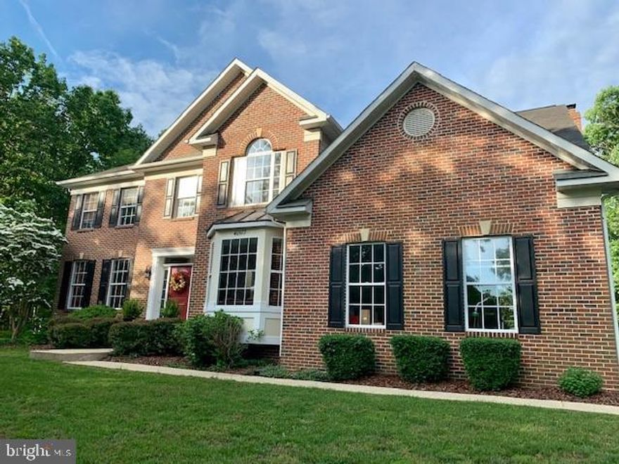 Private lot in beautiful Avenmar Community.         4 Bedroom, 3.5 Bath nestled on a 2.84 acre                  Water privileged with club house, pool, tennis      courts, boat ramp and dock with kayak storage,  playground, horse trails, barn, riding.  main level gleams with fresh paint.  All new stainless steel appliances in the kitchen.  Formal living room and dining room. Gourmet kitchen        with granite counters, library/office, wood             burning fireplace,   wood floors on main level,      master bath with separate shower, walk in closet, and sitting area.  Basement with rec room.            Multi level deck overlooks quiet backyard.  New  front door, new back door, Added molding in the office, new light fixtures, in entry, dining room     and kitchen, new double oven, new granite             counter tops, new carpet and flooring in family     room,  new shower in master bath, molding added to half bath on main floor.