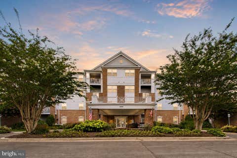 Photo of 2604 Chapel Lake Drive #202, GAMBRILLS, MD 21054 (MLS # MDAA2154342)