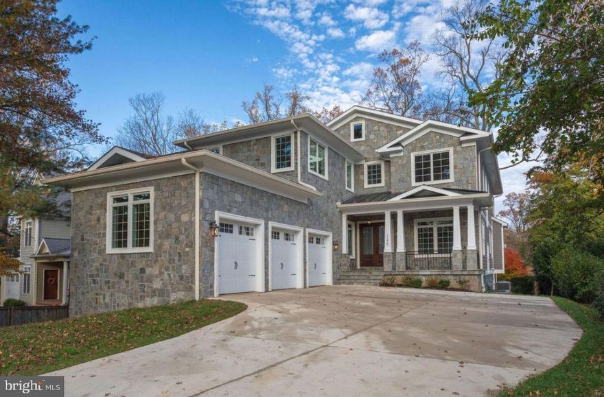 High QUALITY NEW CRAFTSMAN in LANGLEY high school pyramid with SUPERB finishes! Stone elevation blended with hardi-plank. OPEN and SPACIOUS floor plan with 10-and 9-ft ceilings, 2-story front foyer, WIDE and WELCOMING staircase. Spacious SUN-filled rooms. Large GOURMET kitchen with Thermador STAINLESS STEEL appliances, island with prep sink and faucet, butler's and LARGE pantry, UPGRADED granite counter-tops and cabinets. DELUXE trim-work through-out. Direct vent gas fireplaces with stone full-height back-splashes. Family room with COFFERED ceiling. OAK hardwood floors on entire 2-levels. IN-LAW-suite on main level. BEAUTIFUL master-suite with HUGE sitting area, ample WALK-IN closet and vaulted ceilings, EXOTIC master bathroom with separate soaking tub, heated MARBLE floor, rain shower with MULTIPLE shower-heads, tile-to-the-ceiling shower and corner soaking tub, elongated commode and flooded with 4" led recess lights. Allocated and DISTINCT bathroom to each bedroom. FINISHED rear walk-up basement with upgraded and designer carpet, AMAZING wet bar with EXTREME serving counter-top and wine racks. Ceiling fan pre-wiring. W&D hook-ups. Trex DECK with patio below. LoE glass windows. Side loading 3-car garage. FLAT landscaped with 3-exterior garden hose bibs, spacious and PRIVATE back yard.  Energy efficient dual zone heating and cooling.  PERFECT FOR LIVING & ENTERTAINING!