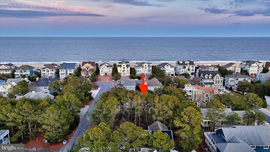 Nestled just a few houses from the pristine shoreline in North Bethany, this wooded lot offers the perfect opportunity to build your dream coastal retreat in an exclusive gated community. Enjoy the serenity of a private neighborhood while being only steps from the ocean, where breathtaking sunrises and gentle sea breezes await. Residents enjoy access to top-tier amenities, including a community pool, tennis courts, and guarded beaches for added peace of mind. With this desirable location just minutes from downtown Bethany's shops and restaurants, this property provides endless possibilities for a custom beachside escape. Whether you envision a luxurious vacation home or a full-time seaside sanctuary, this rare offering is a must-see for those seeking the ultimate coastal lifestyle.