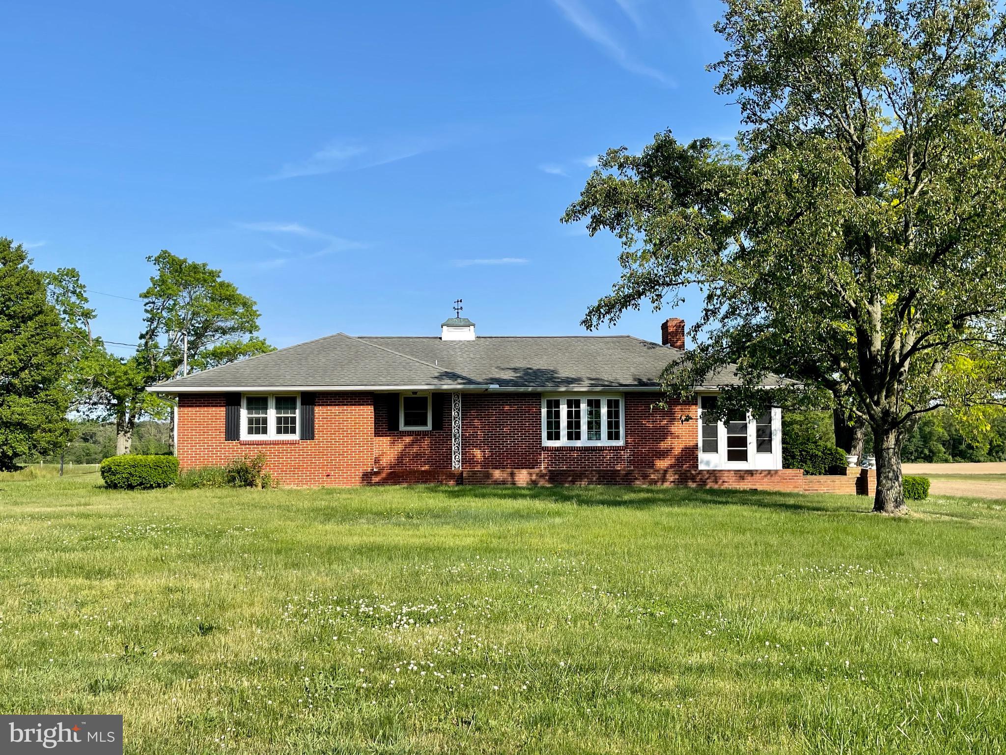 Gorgeous 2 acres in Chestertown. This rancher is boasting over 2400 sq ft with an unfinished basement. As you walk into this home you walk into the large living room with gorgeous hardwood floors and a wood burning stove. Off of one end of the living room is a relaxing screened in porch and off the other end is a gorgeous deck with bench seating all over looking the 2 acres of privacy. As you walk into the living room, to the left is the kitchen and 3 Large bedrooms, and 2 full bathrooms. Downstairs you have a full unfinished basement ready for your finishing touches or perfect for storage. Back upstairs you have a separate laundry and mud room. There is a detached garage with full apartment and enclosed porch. Great for an in -law suite, office or rental opportunity. Convenient location. All the privacy but still close to all town amenities. Do NOT hesitate on this one!