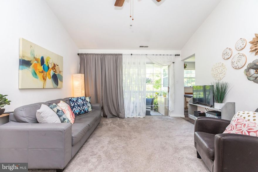 Sought-after, modern and  updated condo with community POOL just steps from your front door!   Enjoy the proximity to shopping, recreation, favorite restaurants, and commuter routes.  ALL NEW flooring and newer carpeting.  Further updates throughout include:  All new SS Appliances, Kitchen cabinets, countertops, sink, interior paint, barn doors at entry closet, and more! Thoughtfully appointed and lively kitchen provides ample storage and prep space.  Kitchen opens to dining area and spacious living area that links to the outdoor with access to balcony overlooking green forested  views.  Sundrenched master bedroom features cathedral ceiling and ensuite master bath and extra-large walk-in closet.   Two large bedrooms provide the opportunity for versatile  living spaces which can be used as offices, guest quarters, play rooms, etc.  Don't delay!  Won't last long!